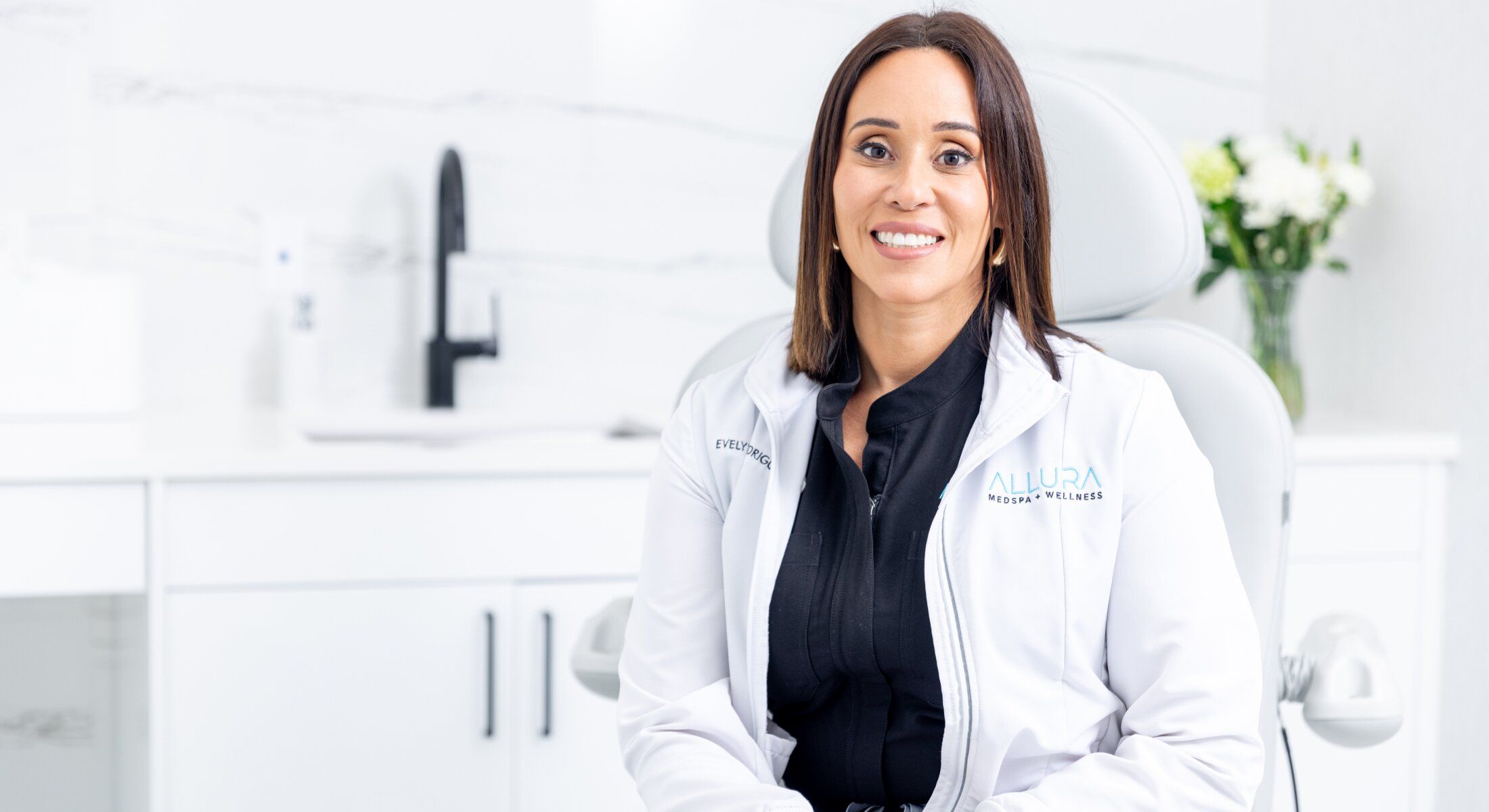 Doctor sitting in a modern medical office.